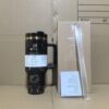 Gourde Stanley Flowstate Tumbler avec anse — noir avec motif doré, finition dorée sur le bord supérieur, motif personnage félin doré stylisé avec noeud
