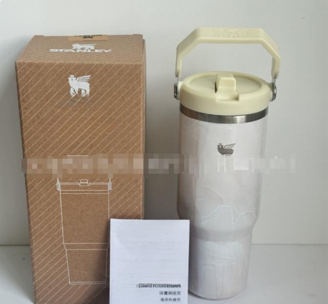 Gourde Stanley IceFlow Flip Straw Tumbler 30 OZ / 887 mL avec anse — blanc/crème marbré, anse et couvercle crème