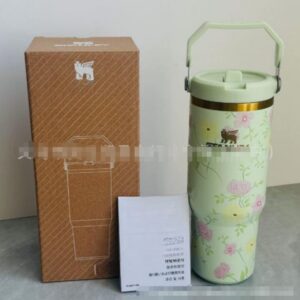 Gourde Stanley IceFlow Flip Straw Tumbler 30 OZ / 887 mL avec anse — vert clair / menthe, motif floral rose et jaune, motif floral: fleurs roses et jaunes avec