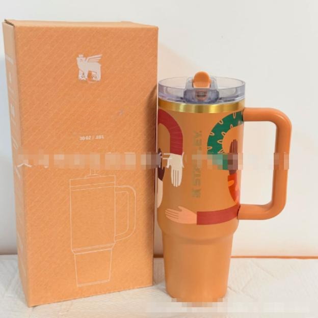 Gourde Stanley Quencher H2.0 Tumbler 30 oz avec anse — orange, motif illustrations blanches/multicolores de mains
