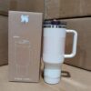 Gourde Stanley Quencher H2.0 Tumbler 40 oz / 1.18 L avec anse — blanc / rose très pâle