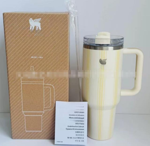 Gourde Stanley Quencher H2.0 Tumbler 40 OZ / 1.18 L avec anse — crème / jaune pâle rayé, motif fines rayures verticales jaune pâle