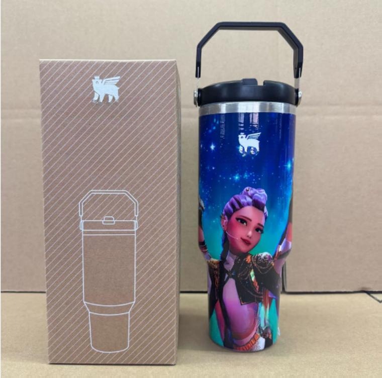 Gourde Stanley Quencher H2.0 Tumbler 40 OZ / 1.18L avec anse — noir, motif groupe de personnages féminins stylisés