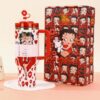 Gourde Stanley Quencher H2.0 Tumbler avec anse — blanc et rouge, motif personnage féminin de dessin animé aux