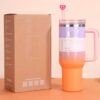 Gourde Stanley Quencher H2.0 Tumbler avec anse — dégradé violet à orange, motif aucun personnage