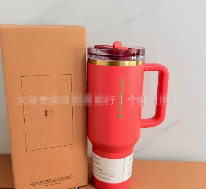 Gourde Stanley Quencher Tumbler avec anse — corail / rouge-orangé
