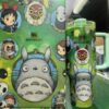 Gourde Stanley Quencher Tumbler avec anse — vert clair, motif personnages de dessin animé variés dans des