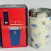 Gourde Stanley Stacking Beer Pint 16 oz | 473 mL avec anse — crème avec motif floral bleu, motif branches et petites fleurs bleues avec