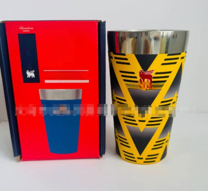 Gourde Stanley Stacking Beer Pint 16 oz | 473 mL avec anse — jaune et noir, motif chevrons/flèches triangulaires jaunes